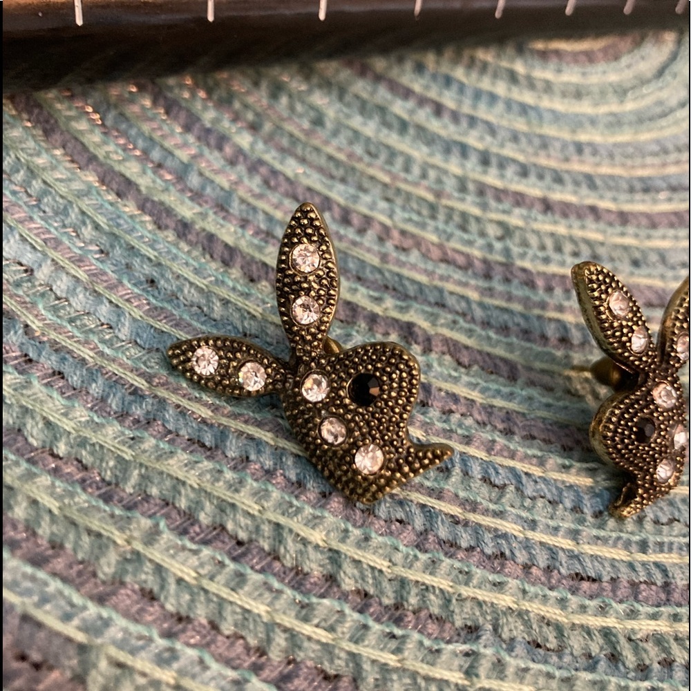 Playboy post earrings.  Brass color w/ rhinestones